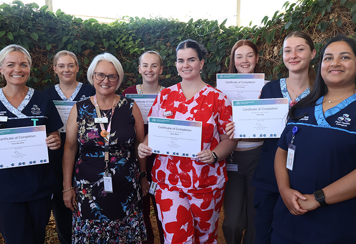 A large group of nursing and midwifery graduates who will be working at Peel Health Campus
